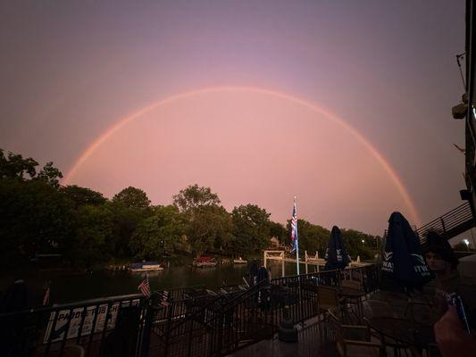 Rainbow during heavy rain taken from the deck