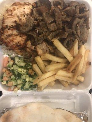 Two meat combo plate w/ chicken and gyro. Sides: middle eastern salad & fries. Made with fresh ingredients and love