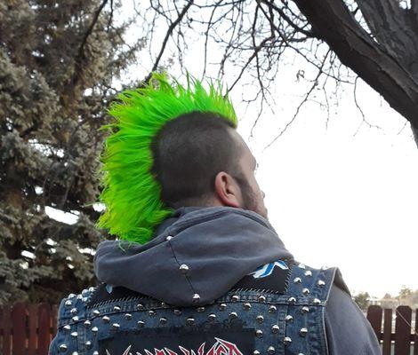 AgainLorie enjoys the vivid colors. Super rad mohawk!