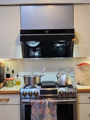 Upgrade your range hood to a powerful 850 cfm FOTILE Range Hood for $1300. It's perfect for Chinese stir fry cooking.