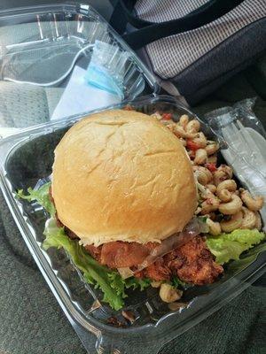 Fried chicken sandwich with side of pasta salad