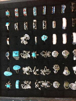 Sterling silver rings. Some with  turquoise from the southwest, and notice some of the rings are poison rings. #fine Jewelry.