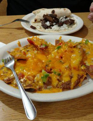 Nachos are excellent.  Retried beans, cheese, onions, and jalapeños...yum!!