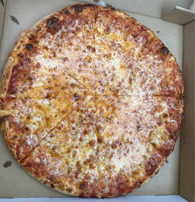 Large Plain Cheese Pizza - tangy sauce and stringy cheese. Slices stuck together. Ask for it well done. Was a bit small but cheap.