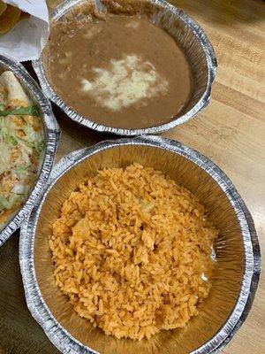 Sides of rice & refried beans.