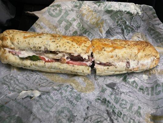 Chicken bacon ranch, spinach, tomato, banana peppers and provolone, Italian herb and cheese bread.