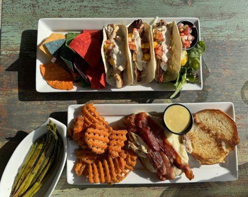 Mahi Mahi Fish Taco and Chicken BLT with waffle fries and asparagus.