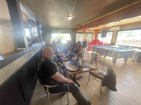 Our crew of bikers enjoying a great breakfast. Black Sheep HDFC