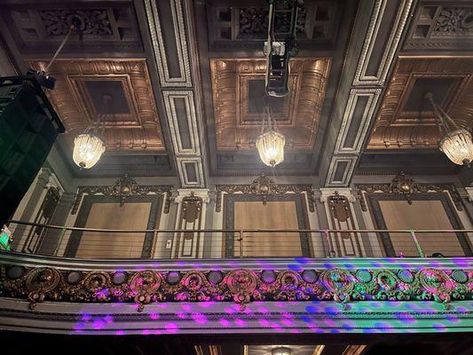 Balcony seating, some chandeliers, an oodles of architectural details