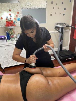 Vacuum therapy is a noninvasive massaging technique that helps to lift your skin via a mechanical device equipped with suction cups.