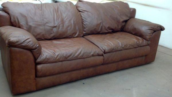 Leather replaced on cushion and dyed to match rest of sofa