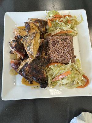 Jerk Chicken with cabbage and rice and peas