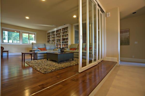 Another view of the new library!  Look at all the storage and those beautiful sliding glass doors!