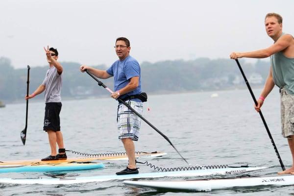 Ryan , Al and Ken having a fun team trip to shark river paddle board race