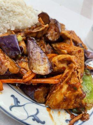 Eggplant with fried tofu and white rice.