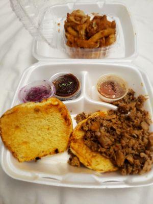 Blues on Franklin's dry bbq sandwich, onion rings and a small bbq sauce.