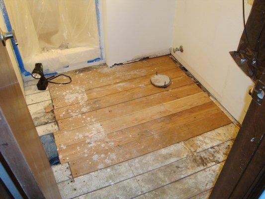 Bathroom floor damage repaired