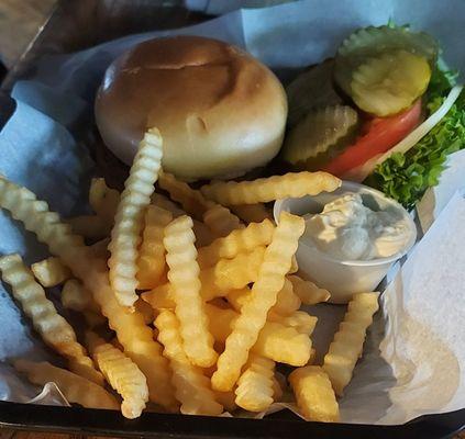 Hamburger with the works with kribkle fries.