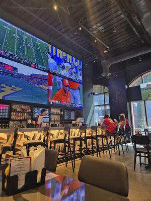 Bar and wall of tvs