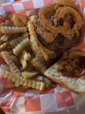 Burger with pulled pork, onion rings and bacon jam