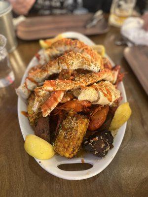 Cajun Corner Platter! Tiger shrimp, crawfish, king red crab, corn on the cob, potatoes, and Andouille.