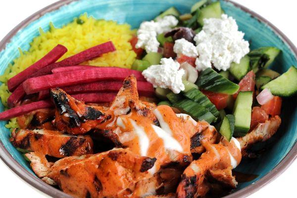 Honest Chicken: Tandoori Chicken, Yellow Street Rice, Pickled Turnips & Beets, Nomad Salad w/Feta, Tandoori & Garlic Sauce.