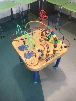 Interesting toy in the waiting room to keep kids occupied and using those motor skills