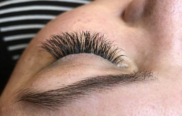 Beautiful eyelash extensions by Nails and Lashes by Hana.