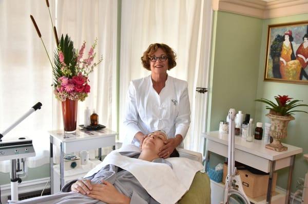 Esthetician Sandi with a happy client