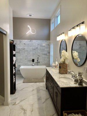 Bathroom floor tile, wall , shower, and vanity was done by KB Construction. LOVE IT