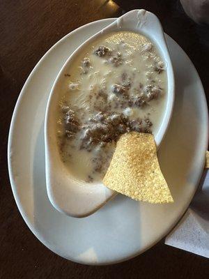 Queso (melted cheese) and carne (ground beef)