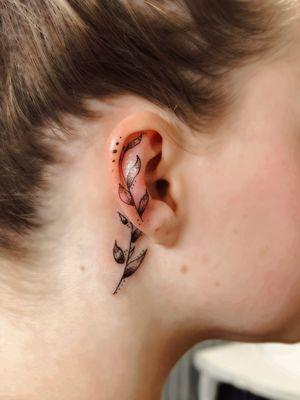 Ear tattoo