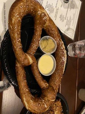 Pretzel with cheese $10