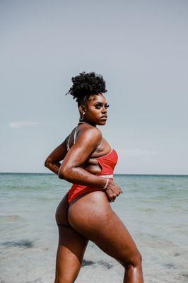 Woman posing on the beach