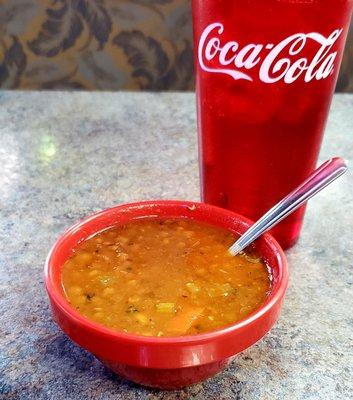 Complimentary soup  This lentil was very good. The lemon chicken contained DRY  chicken chunks... I see a pattern with their chicken.