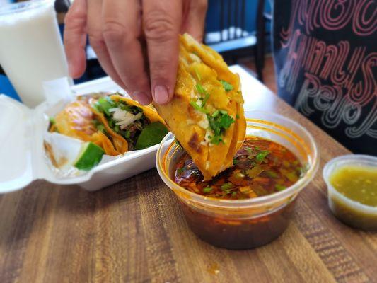 The Dipping Of The Taco In The Broth