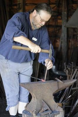 The blacksmith hard at work