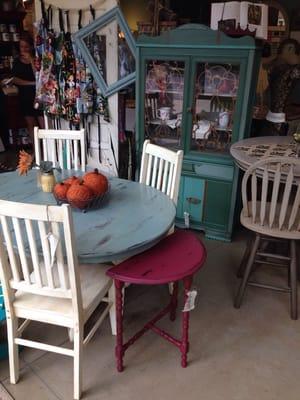 Dining table- and that china hutch in the back is so cool!