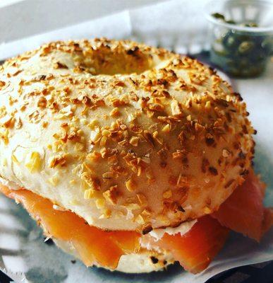 Onion bagel with Lox and cream cheese.