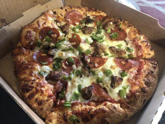 Personalized small pizza with pepperoni, sausage, onion, and green peppers