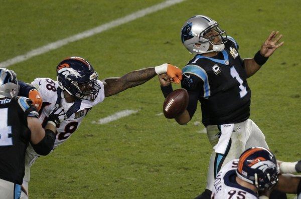 Cam Newton gets stripped in Super Bowl 50 against the Denver Broncos. February 7, 2016.