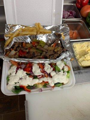 Steak with salads with fries