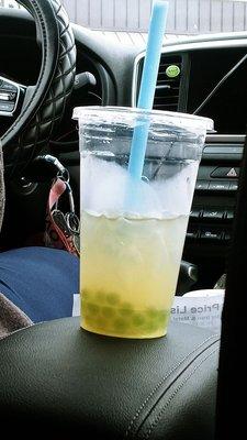 Plain green tea iced with kiwi popping Boba.