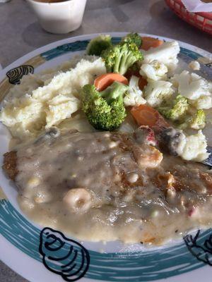 Grilled Catfish with seafood cream sauce, mashed potatoes & mixed veggies