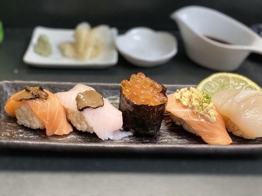 Truffle salmon, truffle yellowtail, ikura, garlic scallion salmon, and scallop sushi's!!!