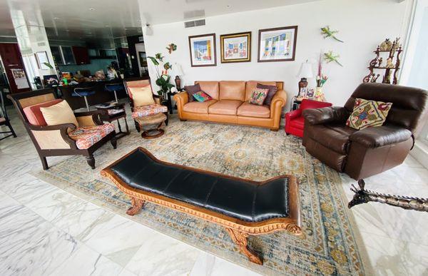 Living room with newly reupholstered chairs by Karen & Don.