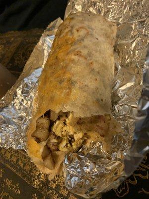 Breakfast burrito with sausage and bacon