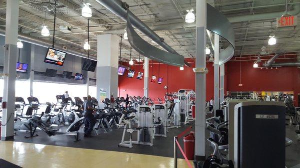 The cardio area at our gym. Tons of TV's for you to watch during workouts