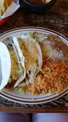 Ground beef tacos with rice and beans.  (lunch portion)