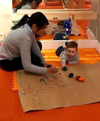 James and his teacher explore new infant-appropriate materials to make drawing accessible to the youngest children